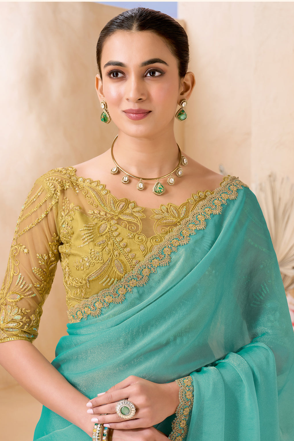 Sea Green Designer Saree with Golden Embroidered Blouse